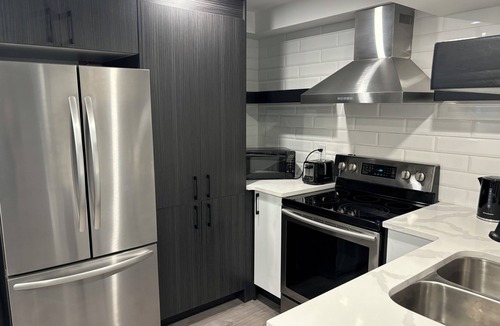 Kitchener Apartment | Modern, clean, bright two bedroom lower level look out duplex with large windows
