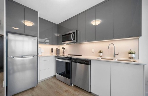 Kitchener Apartment | Modern Suite with City Views