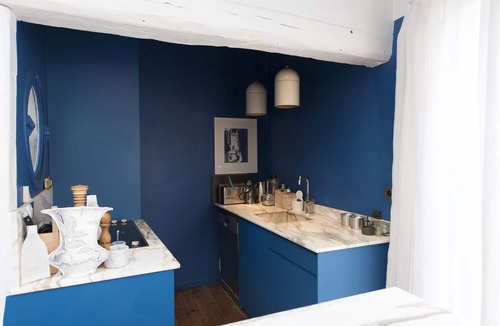 Quartier de Rochechouart Apartment | Modernist Style by the Folies Bergère, by Veeve