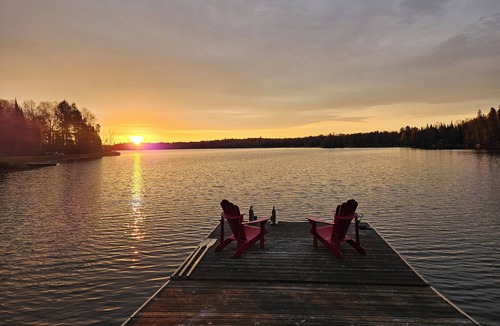 Unorganized Centre Parry Sound Cottage | nCozy waterfront cottage, sandy beach front, sunken hot tub, with putting green.