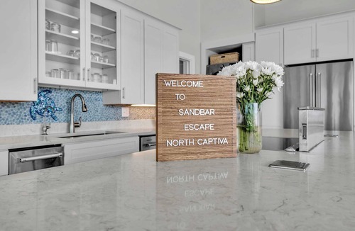 Captiva House | NEW! Beachfront! 3BR Suites Sustainable Home + Private Dock