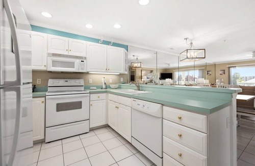 Heron Harbour Isle Condo | New for 2024 - 3 BR 2 BA Unit with Water Views and a Pool
