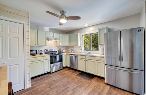 Tunkhannock Township Cottage | New! Hot Tub, Fire-pit, Shuffleboard, Game Room, Kids Play Area and More!