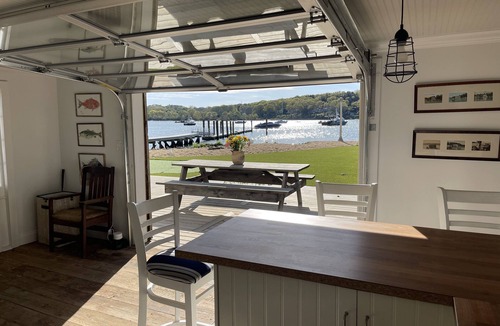 Northport Cottage | Northport quaint restored Boathouse with sunset views!