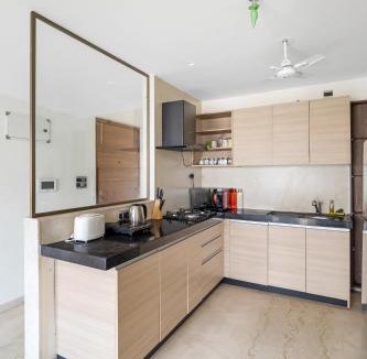 Kurla Apartment | OV Premium Apartments near BKC by SquareOne Stays