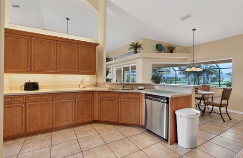 White Marsh House | Paradise Found - Enjoy sunny afternoons in this beautifully decorated pool home