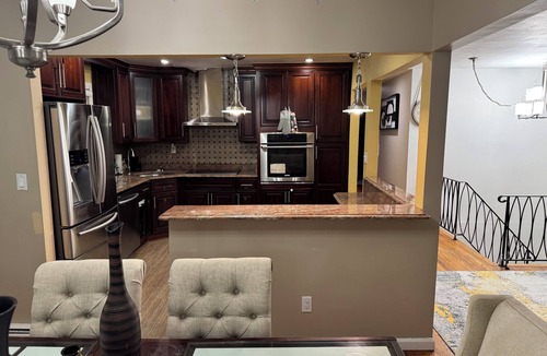 Merrick House | PEACE OF MIND IN THIS CHARMING UPPER LEVEL 3 BEDROOM 1 BATH SUITE