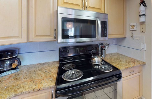 Sunset Beach Condo | Picture Perfect Views From Every Window! Corner Unit on Sunset Beach in Treasure Island.