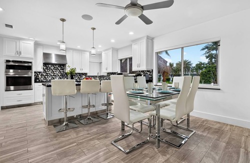 Bel Air House | Pompano Beach Retreat Private Pool + Canal-Front Tiki Lounge | Coral Current