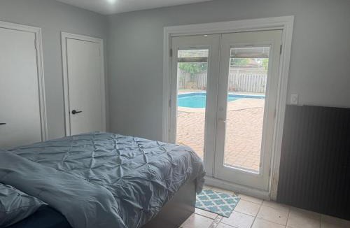 Brampton West Villa | Poolside Retreat with Private Patio