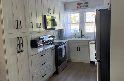 Sunset Beach House | Private Charming Waterfront House - Walk To Beautiful Sunset Beach