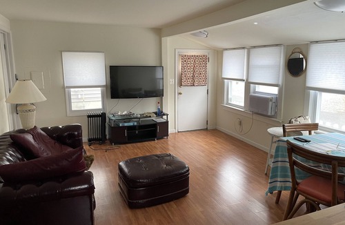 Ortley Beach Cottage | Private cottage walking distance to beach, bay, surfing, boardwalk & playground.