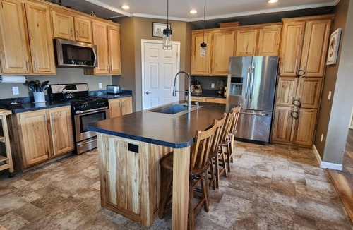 Conesus House | Private Finger Lakes Getaway with a Pool, Hot Tub, and Sauna, timber frame porch