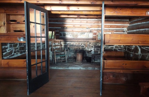 Limerick Cottage | Private water (boat) access, rustic offgrid log cabin on class five lake.