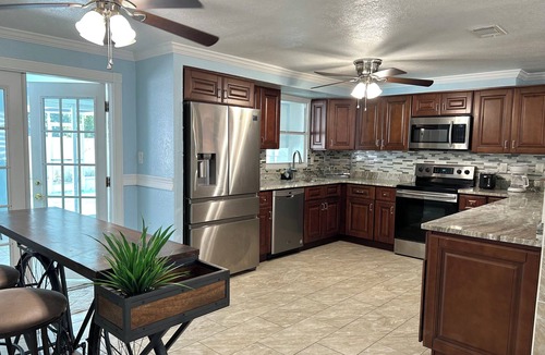 Pinellas Park House | Quiet Pool Haven: 4BR - 9PPL, AC, WiFi, and Beaches Nearby