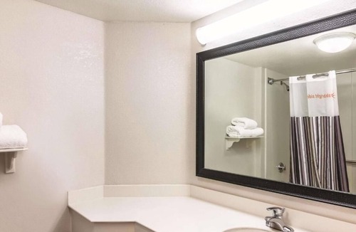 Airport North Hotel | Refreshing Stay Near Downtown Orlando & Local Attractions | Pool | Free Shuttle