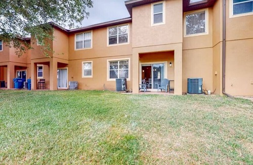 Wellington House | Regal Palms Townhome: Sunshine, Pool, & Golf Fun