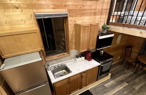 Tiny Cabin | “Relax in our cozy tiny home. Embrace simple, peaceful living. Book your stay!”