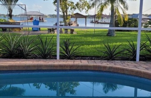 Sylvan Shores House | Relaxing Getaway on Peaceful Lake Clay- Pool, Patio, Lake