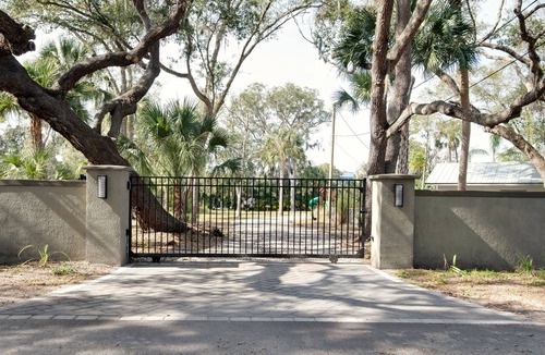 Riverview House | River House w/2-story dock, boat ramp, fire pits outdoor lounge area.