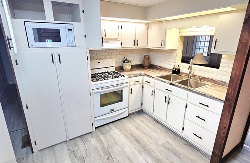 Lindley House | Riverside Retreat for Families & Pets with Game Room