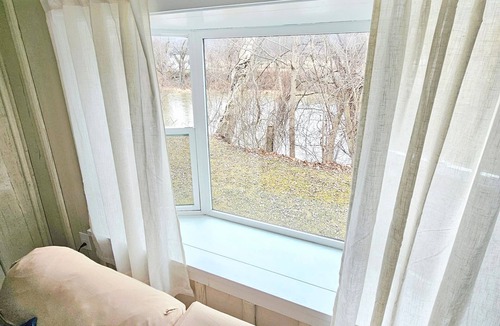 Lindley House | Riverside Retreat for Families & Pets with Game Room