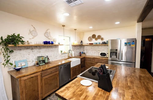Lochmoor Waterway Estates House | Roze Family Villa- heated pool home near river district & waterfront dining!