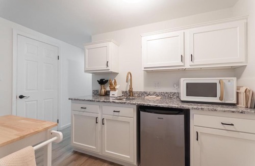 Park Forest Village Apartment | Sanctuary on Sylvan with Golden King Bed