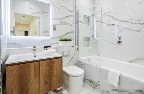Clichy Apartment | Seine Serenity: Quaint 2BR Haven Near Arc de Triomphe with Balcony Bliss