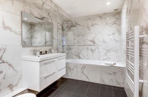 Amerique Apartment | Sejour elegant aux Buttes Chaumont pour 12 pers