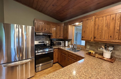 Town of Milo House | Seneca Lake View Retreat sits secluded on a 2 acre lot.
