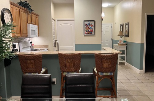 Florida Central Atlantic Coast Condo | Serene Oasis Lakefront Penthouse Facing Disney