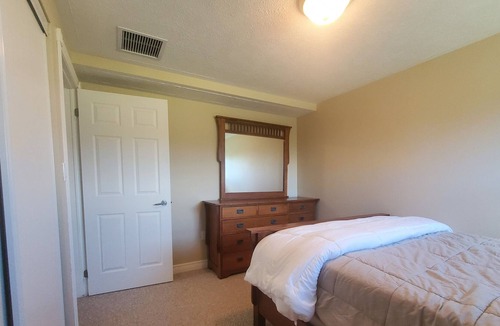 Walkerton Condo | Spacious 1300 ft² condo w/ balcony overlooks river