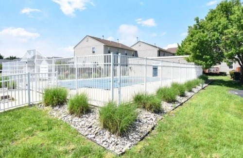 Caine Woods House | Spacious 3 BR 3 Bath home with community pool, porch and deck, WiFi, Full Kit