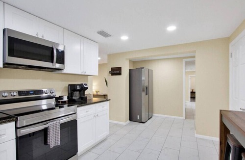Greater Palm River Point CDC House | Spacious 7-Bedroom Retreat for Groups & Families
