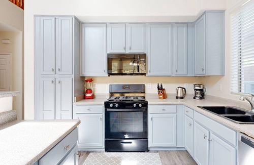 Carefree Crossing House | Sprawling home with an enclosed yard, open layout, fireplace, grill, & W/D