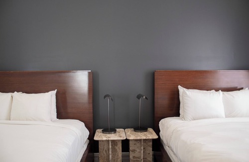 Gayborhood Hotel | StayCozy at The Arco
