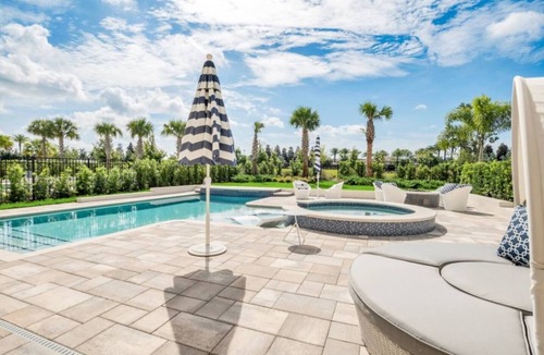 Reunion House | Stunning 5000 Sq Ft Bears Den Luxury Villa w/Outdoor Kitchen & Exquisite Pool