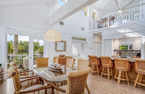 Bokeelia House | Stunning canal-front home with pools, AC, W/D & hammock