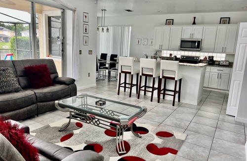 Sunset Lakes Villa | Stunning lakeside location 2 king masters , games room, hot tub 4 miles Disney.