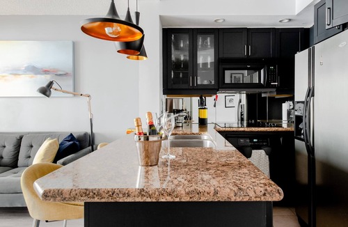 Financial District Apartment | Stylish downtown apartment with private patio and parking