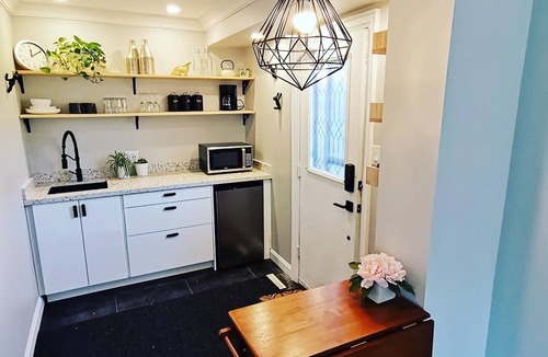 Aurora Apartment | Stylish Main Level Suite with Separate Entrance, Private Patio and 2 Car Parking