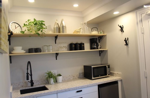Aurora Apartment | Stylish Main Level Suite with Separate Entrance, Private Patio and 2 Car Parking