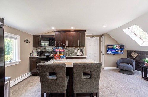Huntington Station Apartment | Stylish Upscale Apt w/Snack Bar & Sunny Deck
