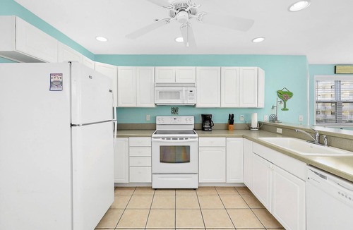 Midtown Ocean City House | Stylish, upscale 3 bedroom condo with a television in every bedroom and living room, free WiFi, and two floors located downtown only a few streets from the boardwalk and only steps to the beach!