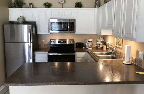 Crystal Beach Condo | SUMMER SPECIALS! Great family condo STEPS from beautiful beach! FREE Parking!