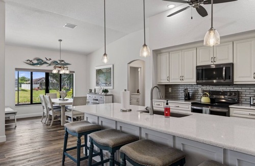 White Marsh House | Sunset Retreat with heated pool