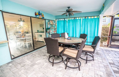 Apollo Beach House | The Flamingo- Waterfront Home with heated pool, hot tub and kayaks!