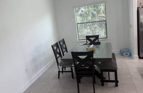Haines City House | The laid-back 4-bedroom Villa features a private swimming pool in Haines City.