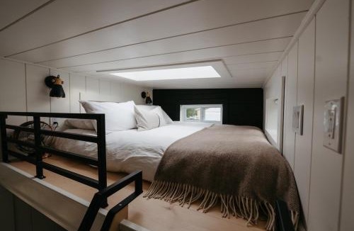 Tyendinaga Mohawk Territory Resort | The Loft - Stargazing Tiny Home with Firepit, Wood Fired Pizza Oven & Movie Projector